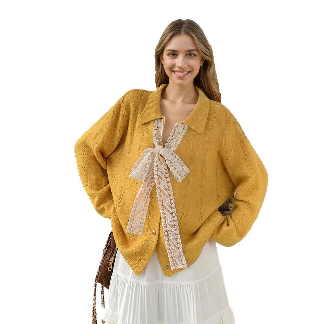 Kvinders strikket sweater med elegant sløjfe applikeret Stilla