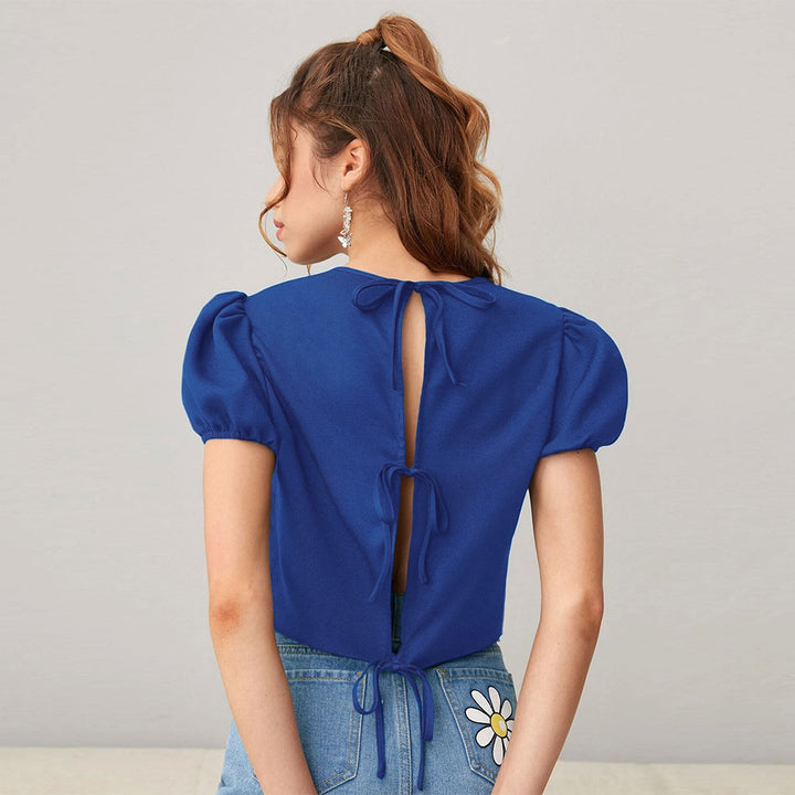 Kvindernes cropped top med puffærmer og blød rund halsudskæring Stilla