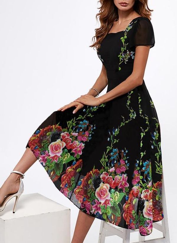 Dame Elegant Maxikjole med blomsterdesign og transparente ærmer Stilla