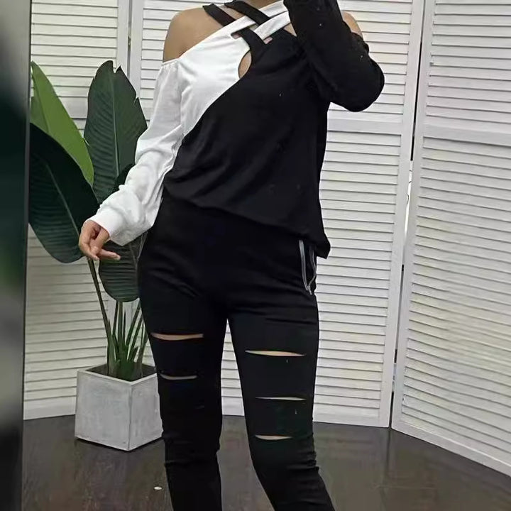 Dame Mode top med cut-out design og asymmetrisk ærmer Skovae