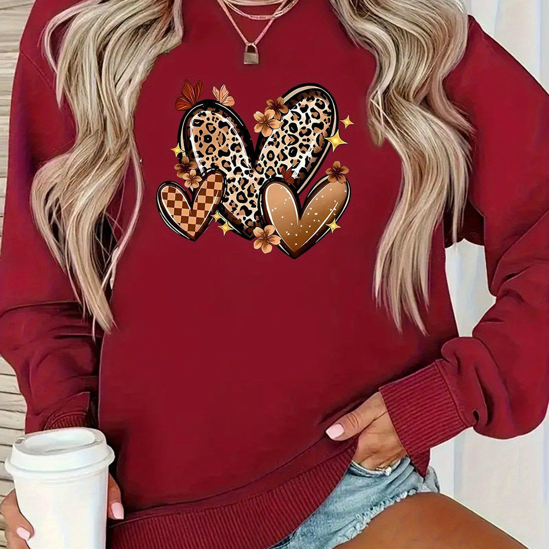 Kvinders sweatshirt med attraktive hjerte motiv.