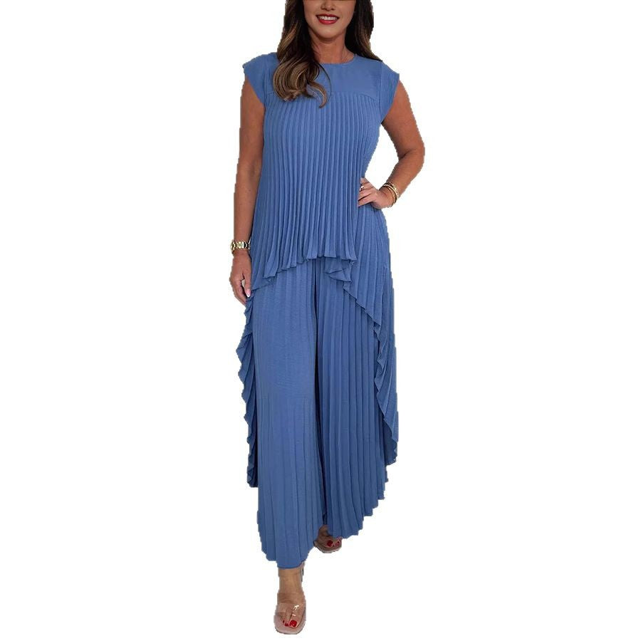 Dame Plisseret Jumpsuit med flydende snit og asymmetrisk design Stilla