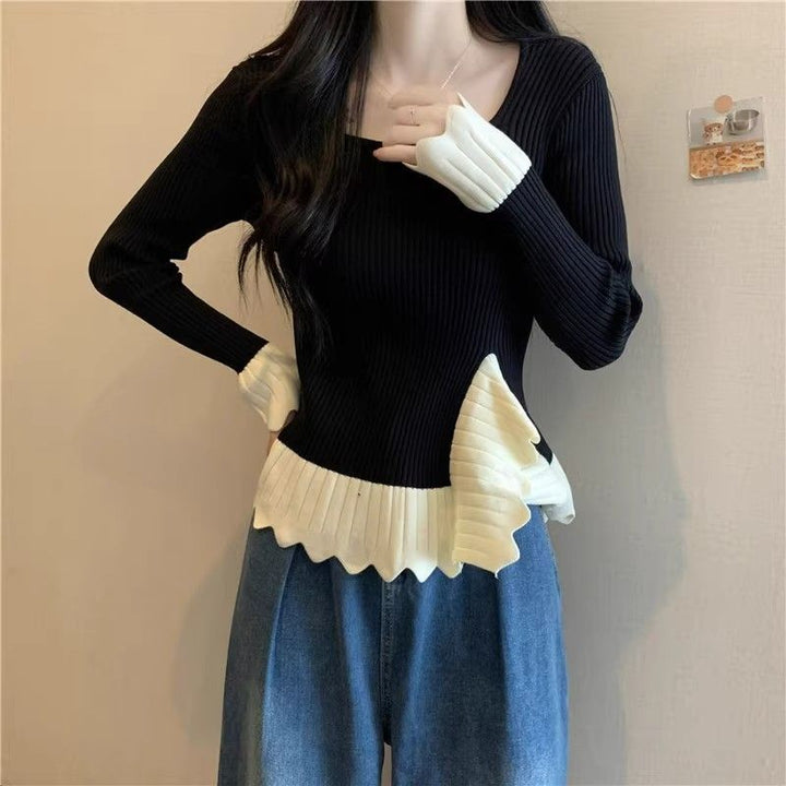 Kvinders fashionable ribstrikkede sweater med asymmetrisk kant Stilla