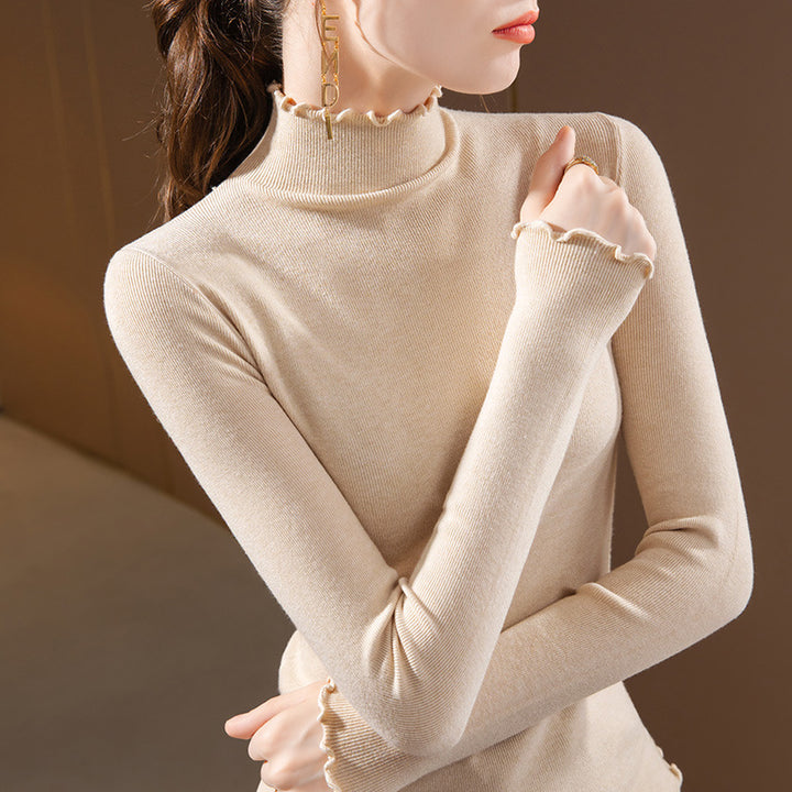 Dame Turtleneck top med elegante flæsedetaljer og fin struktur Stilla