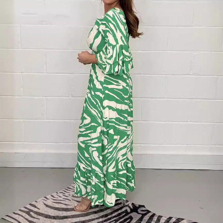 Dame Maxikjole med elegant indpakningsdesign og voluminøse ærmer Stilla