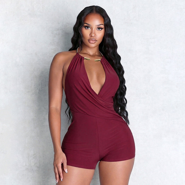 Damen Figurbetonter Playsuit mit tiefem V-Ausschnitt und schwingendem Saum Skovae