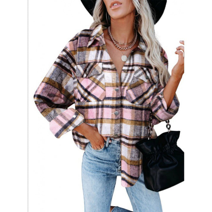 Dame ternet bluse i afslappet oversized stil med lommer Stilla
