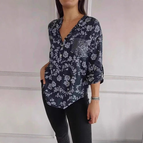 Damebluse med blomstret design og glitrende accenter Stilla