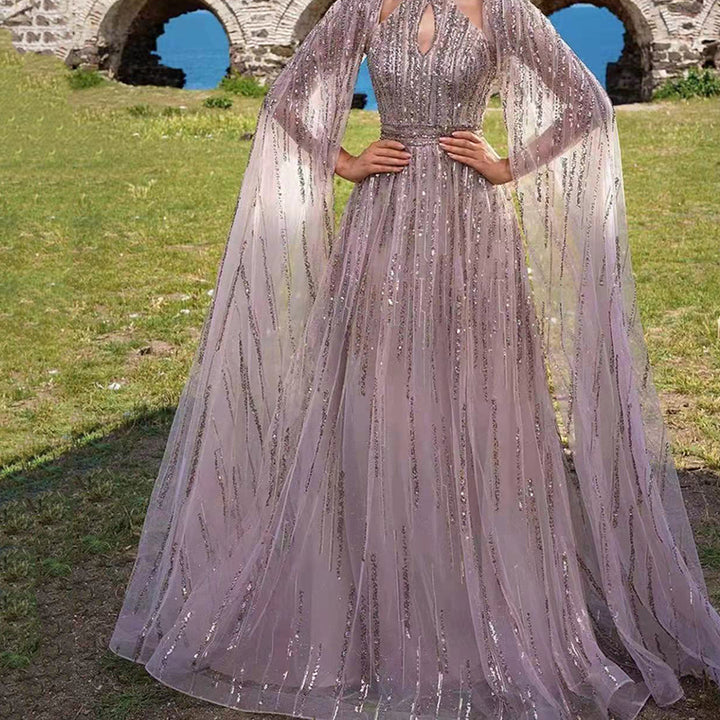 Dame Glamourøst Aftenkjole med glitrende Pailletter og elegant Cape Stilla