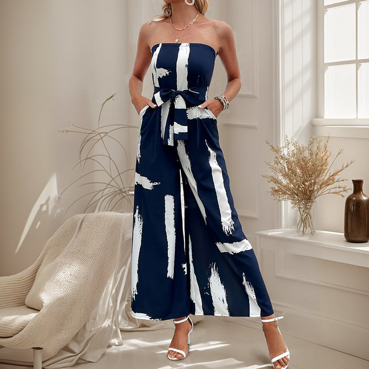 Dame stropløs jumpsuit med bred ben og figursyet bælte Stilla