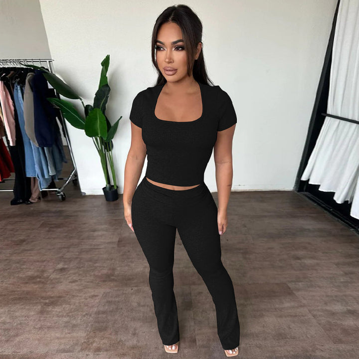 Dame Sporty to-delt sæt med figursyet overdel og seje bootcut-bukser Stilla
