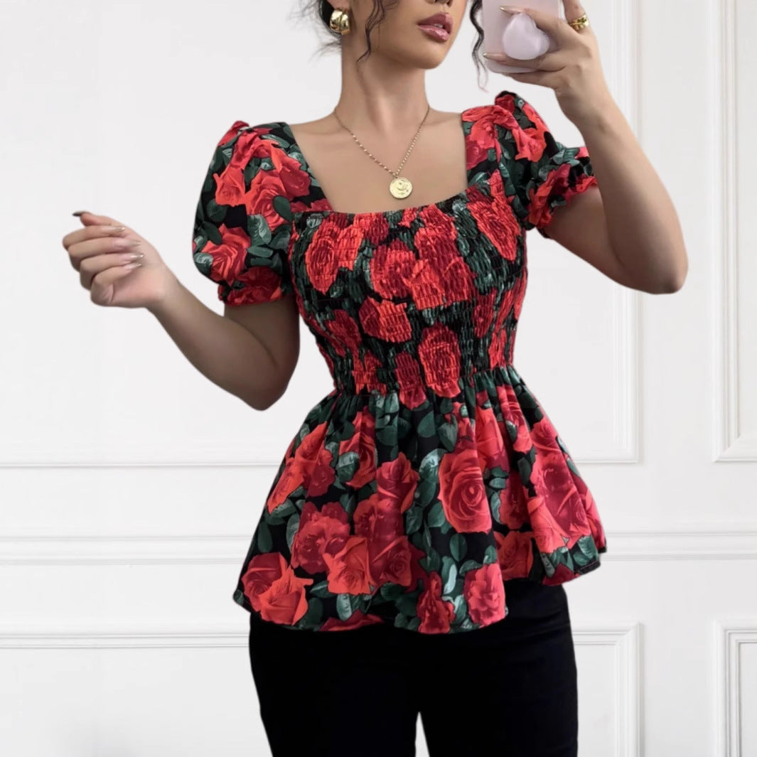 Dame puffærmet bluse med blomstret design og elastisk kant Stilla