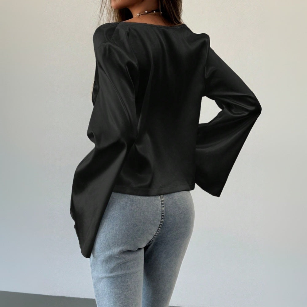 Kvinders elegante bluse med dyb V-hals og afslappet knude detalje Stilla