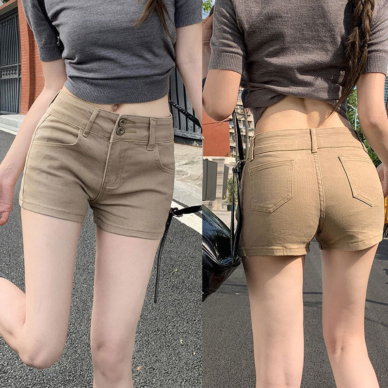 Dame mode shorts med knapdetaljer og høj talje snit Stilla