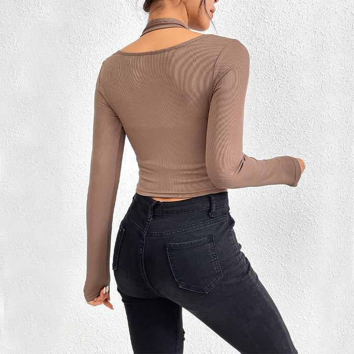 Kvindernes cropped langærmet skjorte med elegant twist design og farve accenter Stilla