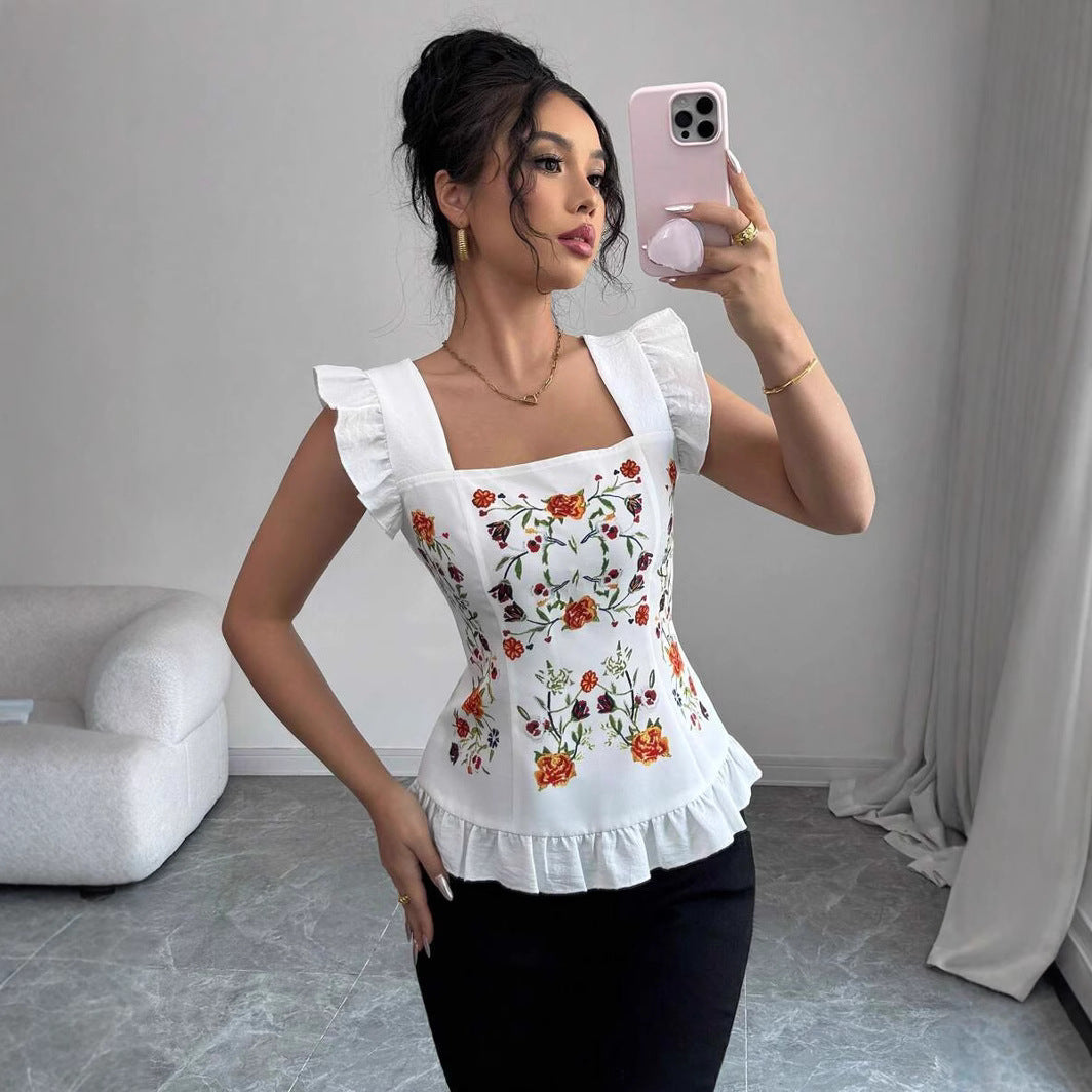 Damebluse med blomster broderier og flæse detaljer Stilla