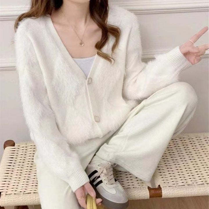 Kvindernes fluffy cardigan med knapdetaljer Stilla