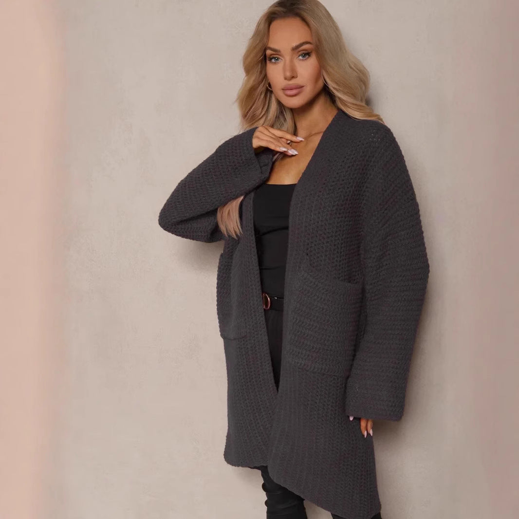 Kvinders oversized cardigan med dyb V-hals og praktiske lommer Stilla