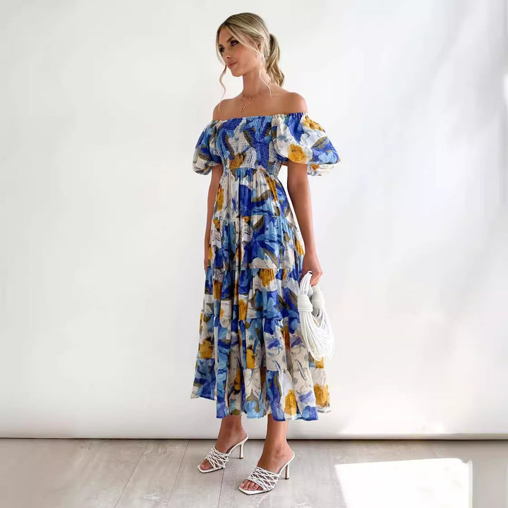 Dame Maxikjole med voluminøse puffærmer og florale detaljer Stilla