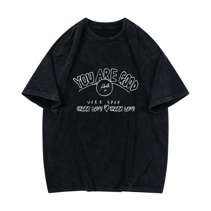 Dame T-shirt med afslappet pasform og positivt statementtryk Stilla