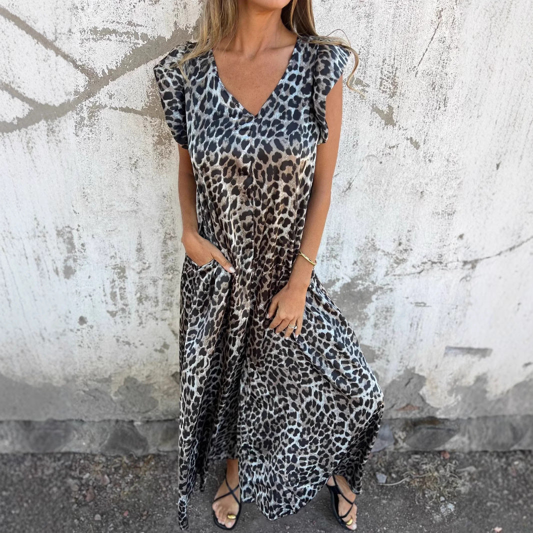 Dame maxikjole med elegant leopardmønster og praktiske lommer Stilla