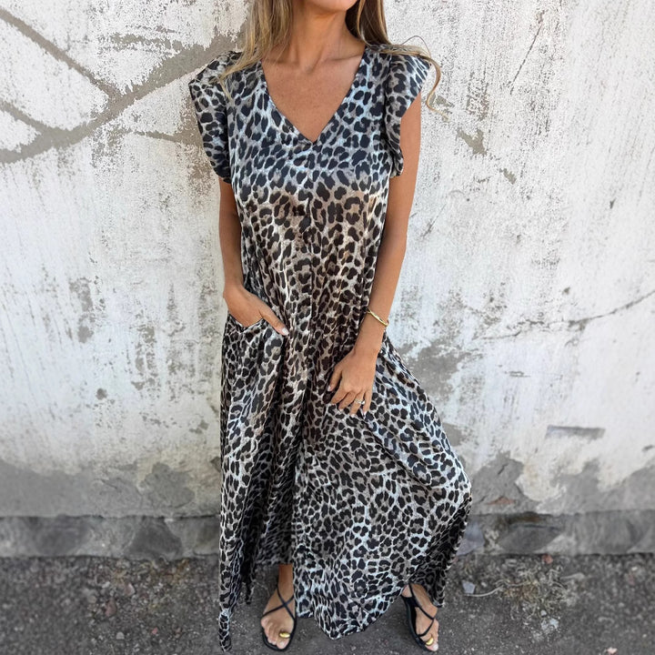 Dame maxikjole med elegant leopardmønster og praktiske lommer Stilla