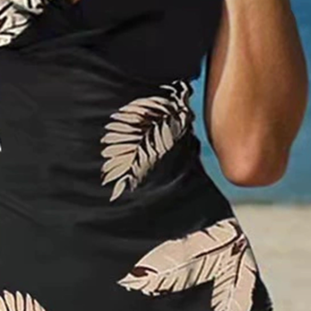 Damernes strandkjole med raffineret snit og elegante bladmotiver Stilla