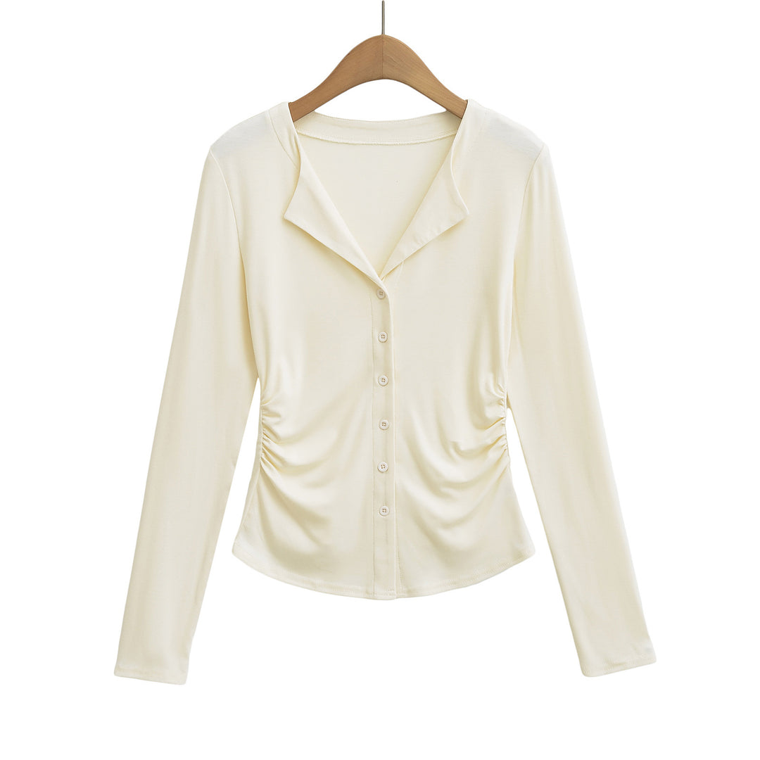 Dame figursyet top med knaplukning og moderne draperingseffekt Stilla