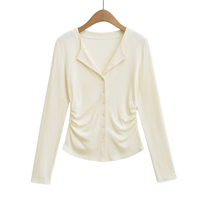 Dame figursyet top med knaplukning og moderne draperingseffekt Stilla