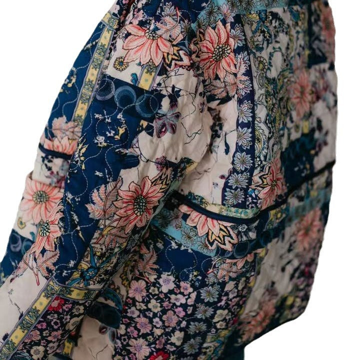 Dame quiltet overgangsjakke med blomster patchwork design og praktiske lommer Stilla