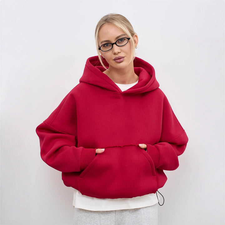 Dame oversized hoodie med kængurulomme og elastiske manchetter