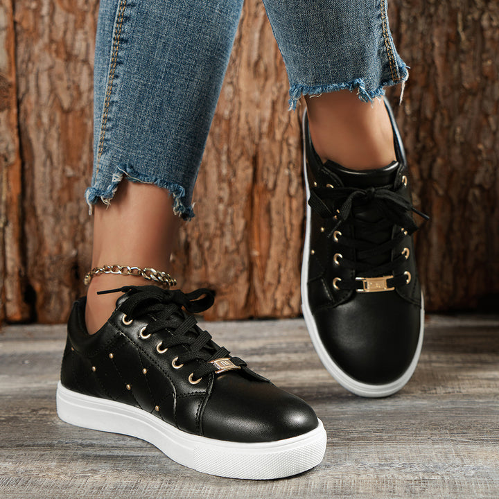 Dame Sportliche Fritids-sneakers med fashionable metalakcenter Stilla
