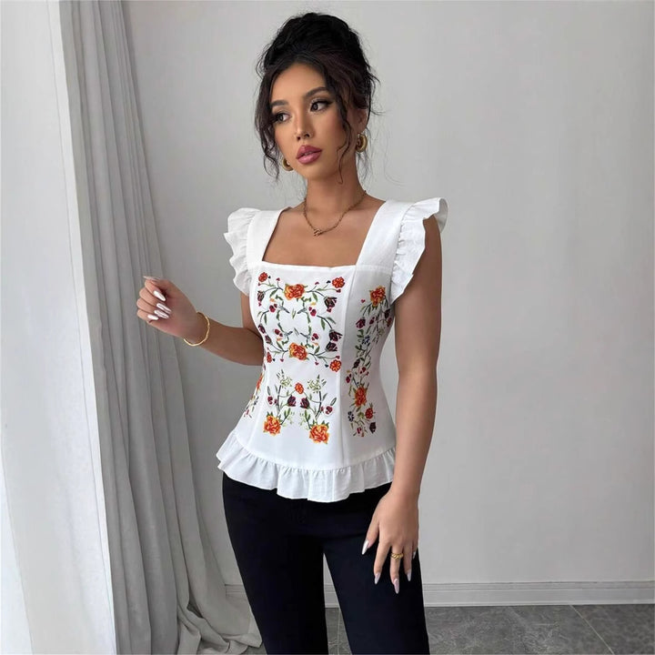 Damebluse med blomster broderier og flæse detaljer Stilla