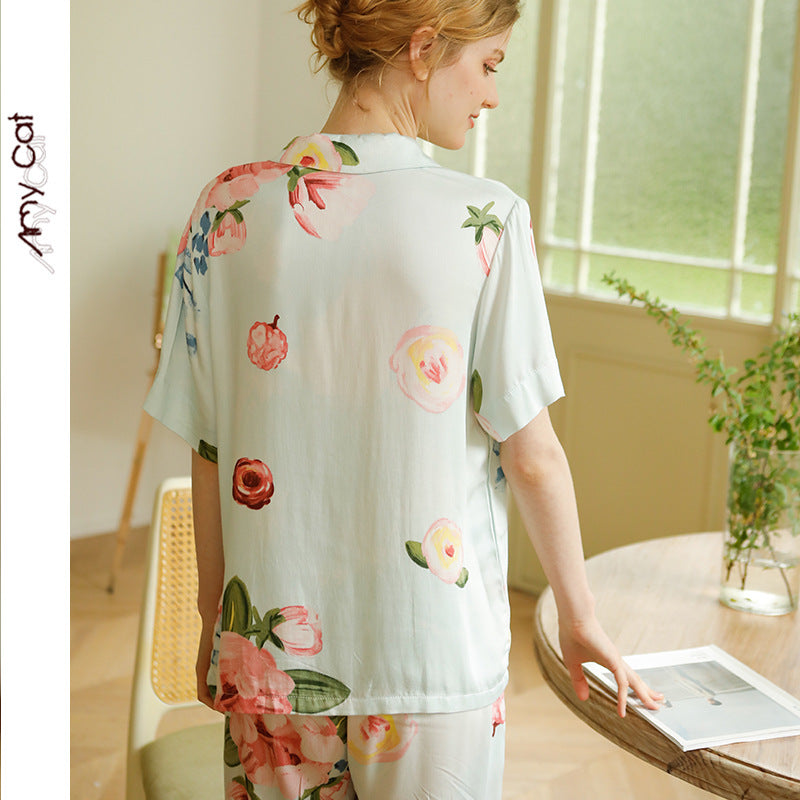Dame elegant pyjamasæt med blomstret design og knapbar top Stilla