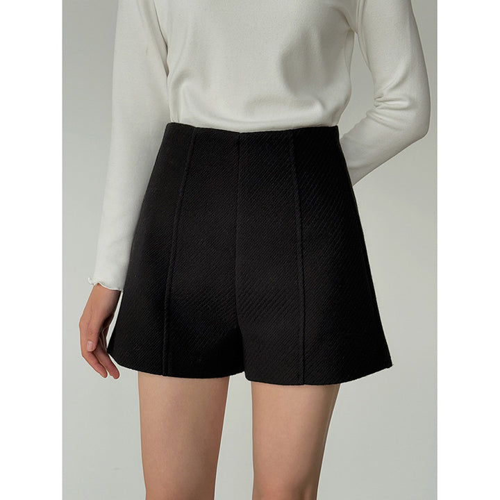 Dame shorts i det elegante houndstooth-mønster med høj talje og folder Stilla