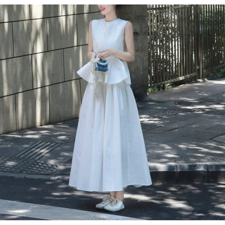 Femme Elegante Udsvinget Maxikjole med Peplum-detalje Stilla