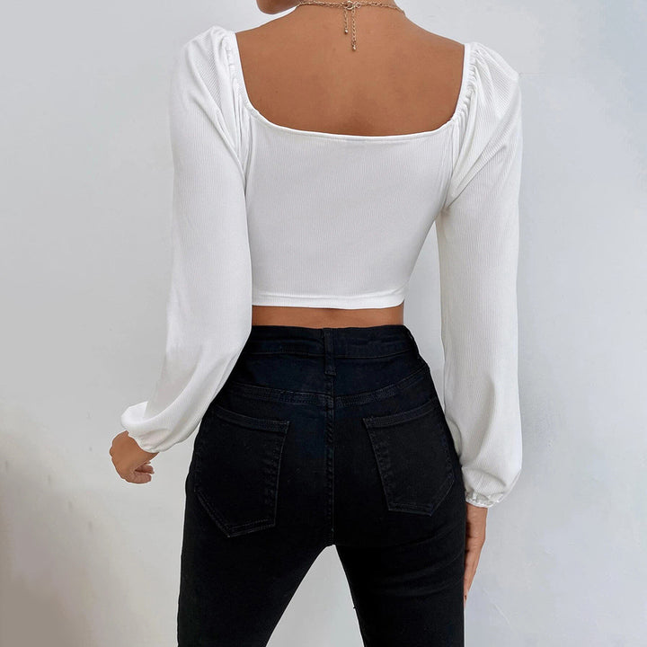 Kvindernes cropped top med stilfuld puffærmedesign og figursyet pasform Stilla