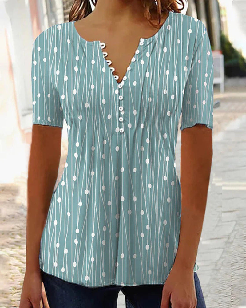 Dame kortærmet bluse med dekorativt knapdesign Stilla