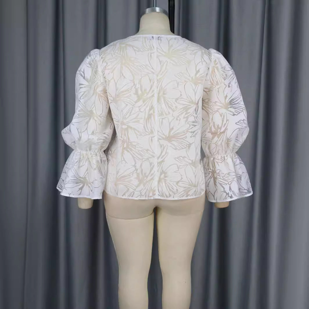 Damer Elegant Bluse med voluminøse ærmer og blomstermotiv Skovae