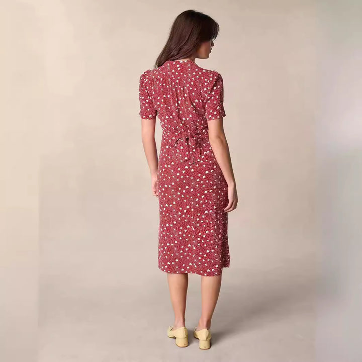 Dame midikjole med elegant V-udskæring og blomsterdesign Stilla