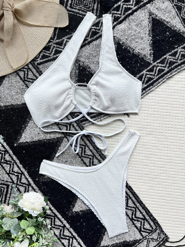 Dame Trendy Monokini med asymmetrisk snit og raffineret ringdetalje Skovae
