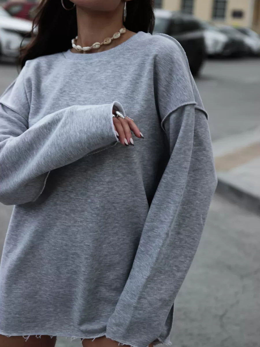 Kvinders afslappede oversized pullover med trendy detaljer og frynset kant Skovae