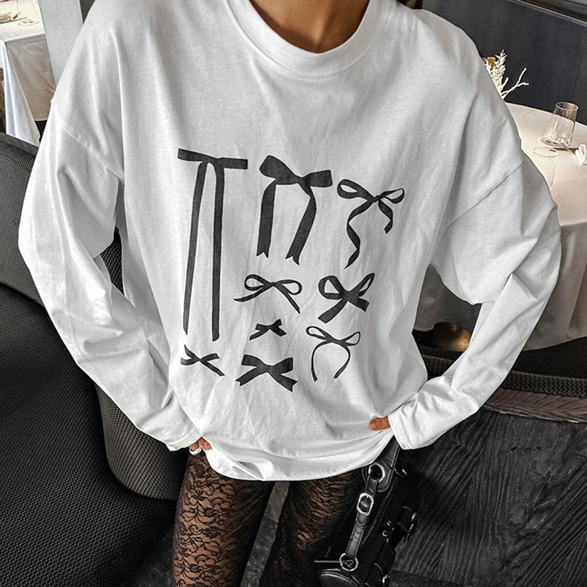 Dame sweatshirt med moderne sløjfe-print og afslappet pasform Stilla