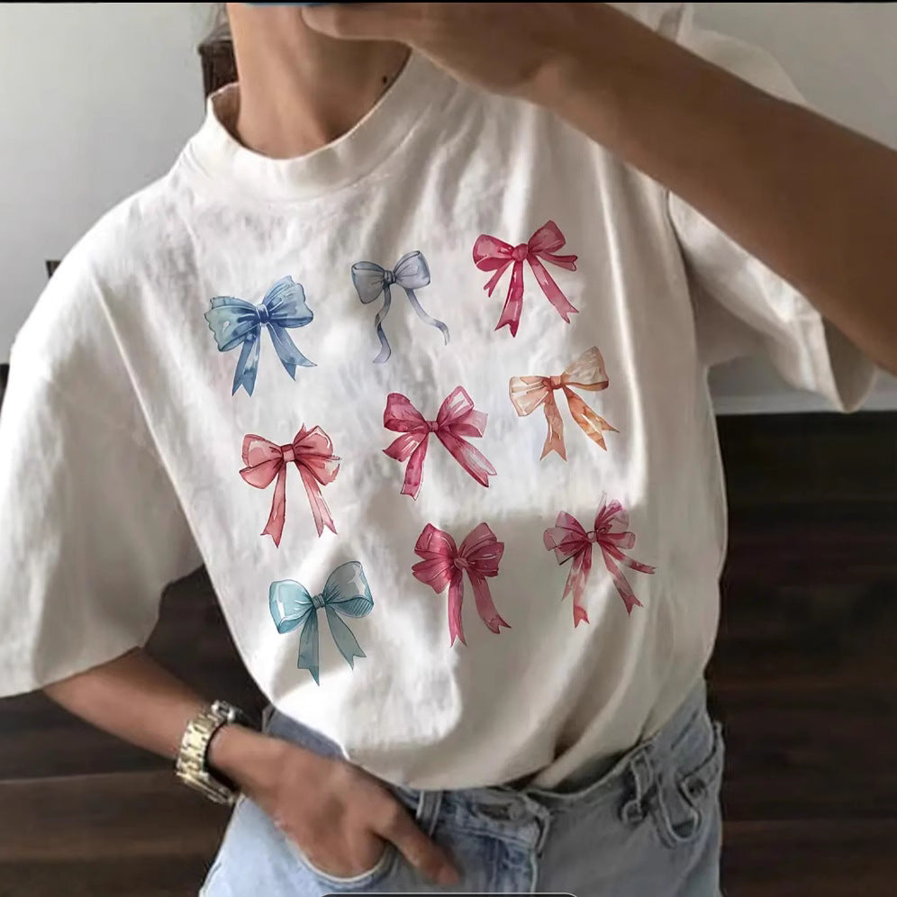 Dame T-shirt med charmerende sløjfemotiv og afslappet snit Stilla