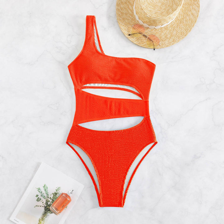 Dame one-piece badedragt med asymmetrisk design og trendy cut-outs Skovae