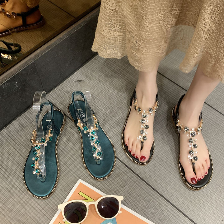 Dame smykkeprydede tæer-split sandaler med elegant remdesign Stilla
