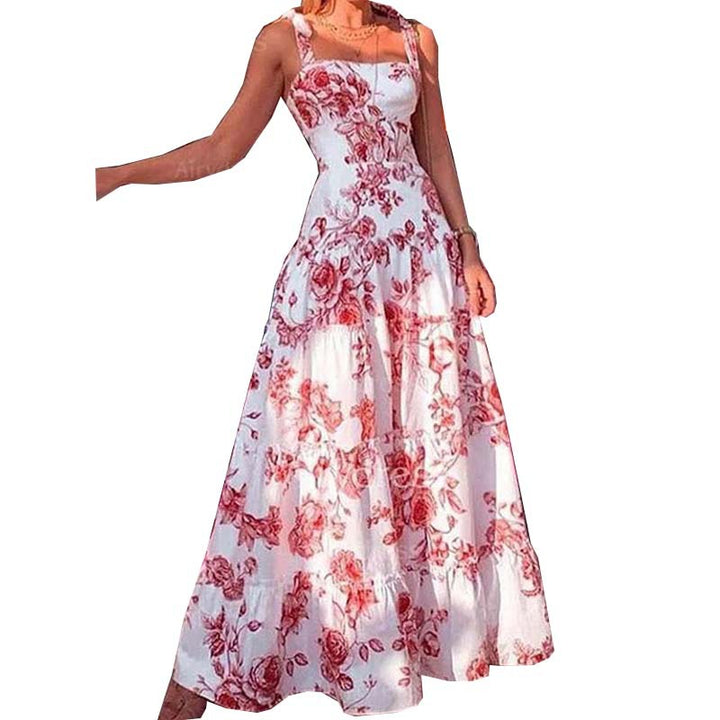 Dame Maxikjole med romantisk blomsterprint og svajende skirt Stilla