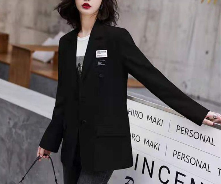 Kvinders elegante oversized blazer med dobbeltknaplukning og moderne detaljer Stilla