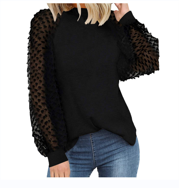 Dame strikpullover med transparente pufærmer Stilla