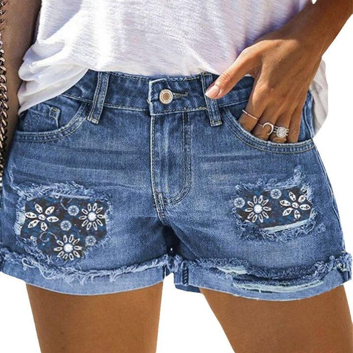 Dame jeansshorts med blomster broderi detaljer og frynset kant Stilla